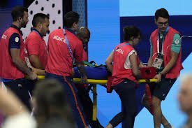 Olympic swimmer collapses after heat race, carried off on stretcher