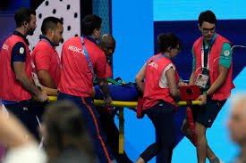 Olympic swimmer collapses after heat race, carried off on stretcher