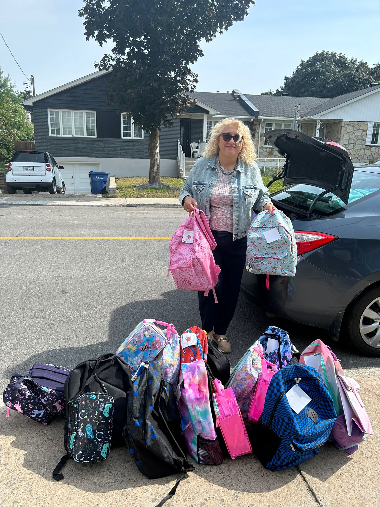 Donation of school bags to primary schools in Chomedey to promote integration, academic success  and fight against children’s poverty